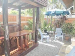 surrounded by a tropical garden, exotic plants, and clean, fresh air.